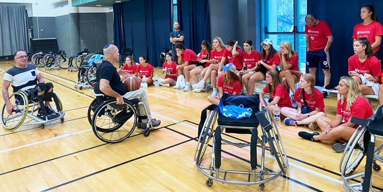 Maccabiah athletes meet wheelchair basketball players at Beit Halochem.