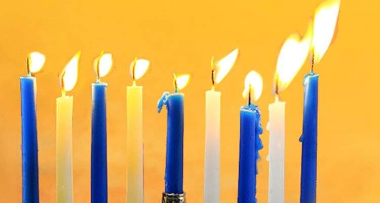 8 lit Hanukkah candles